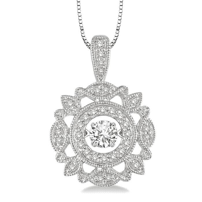 The DiamondVeneer Fashion Dancing Diamond Veneer Sterling Silver Pendant 635P24 features a round, ornate design with a large central diamond veneer cubic zirconia surrounded by intricate patterns and leaf-like shapes.