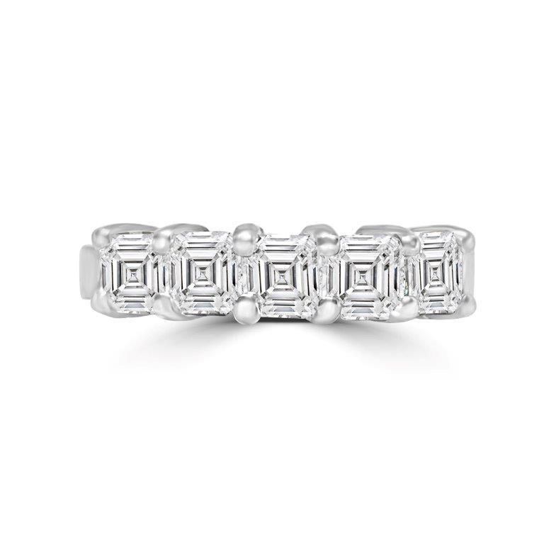 The DiamondVeneer Fashion 1.5CT TW Asscher cut Diamond Veneer Cubic Zirconia Ring (635R007K) features five Asscher-cut stones set in a sleek 14K white gold band for a modern, elegant look.