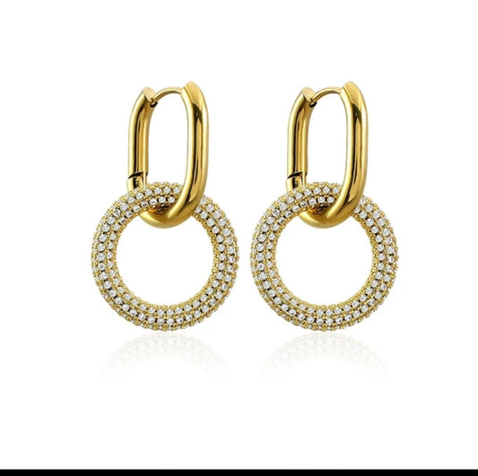 Zirconmania Fashion Jewelrys Stainless Steel Door Knocker Earrings, model Zirconite 856E101, feature circular pendants with sparkling zirconite stones, displayed on a plain white background.