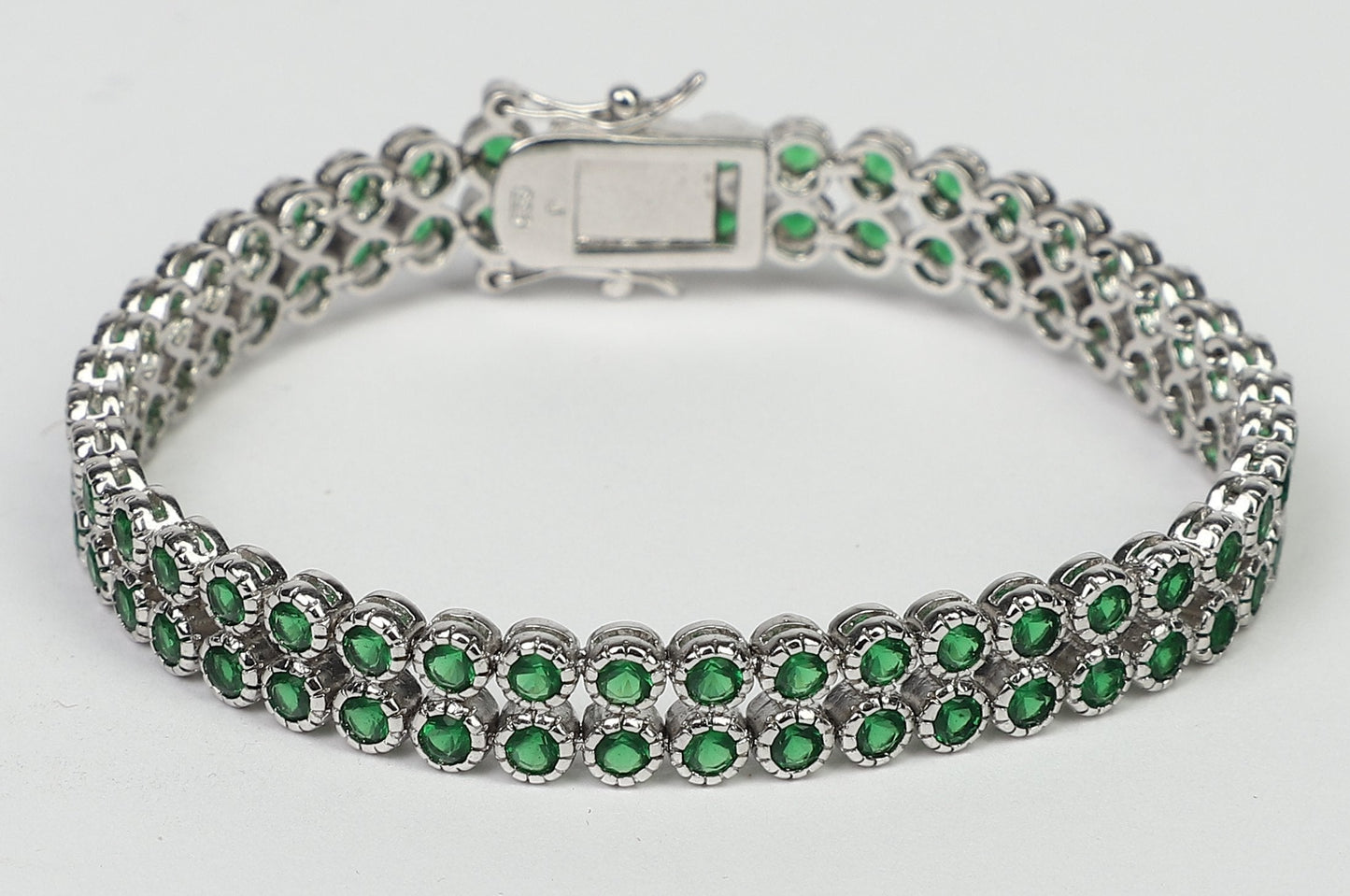 Two rows color Zirconite Cubic Zirconia Sterling Silver w/double safety lock Bracelet. AH3559