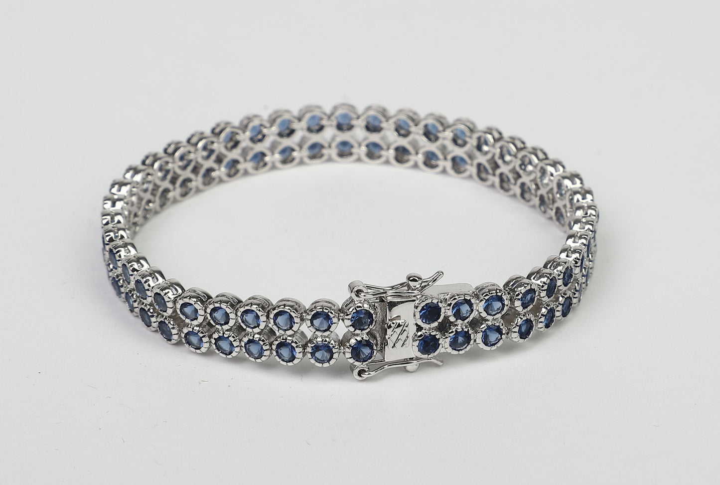 Two rows color Zirconite Cubic Zirconia Sterling Silver w/double safety lock Bracelet. AH3559