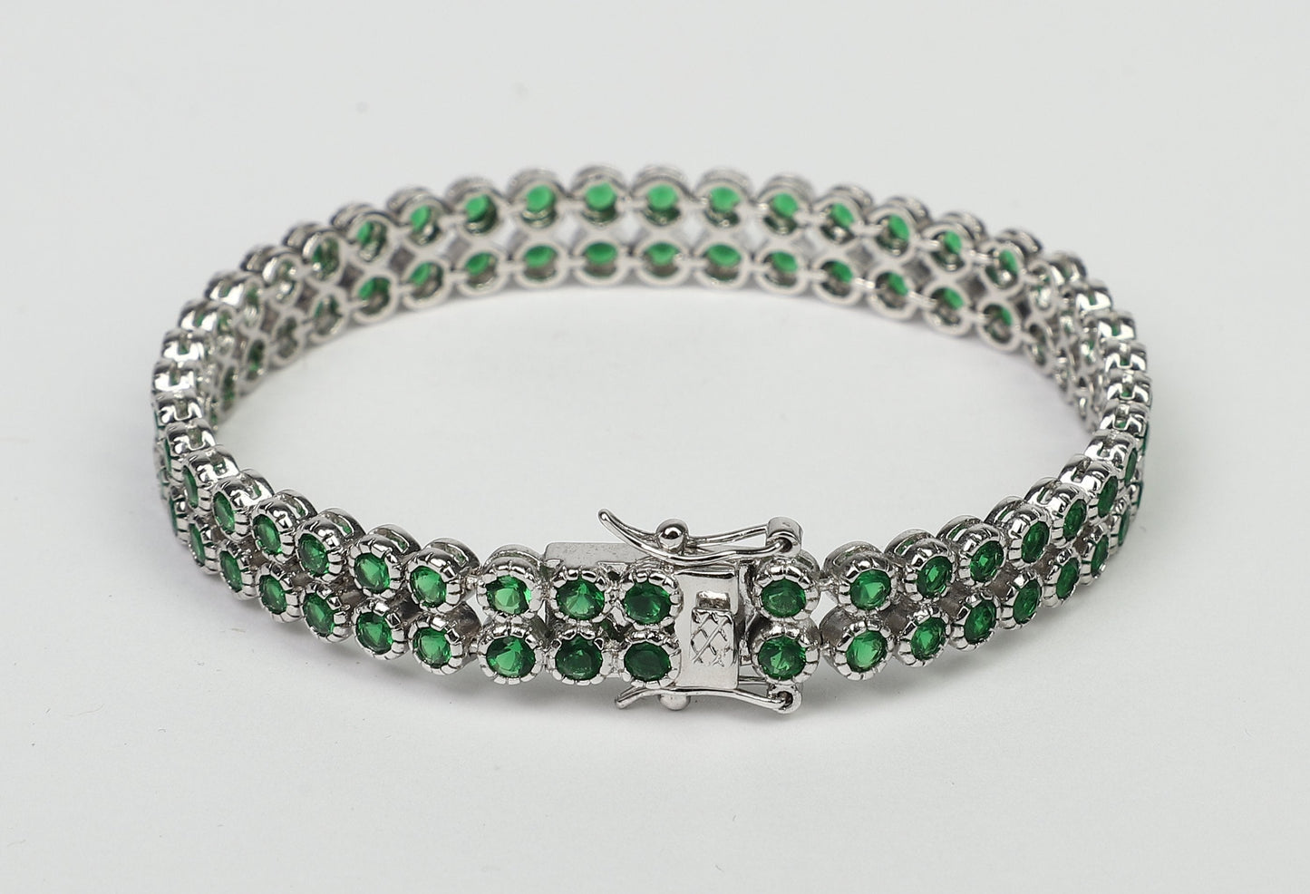 Two rows color Zirconite Cubic Zirconia Sterling Silver w/double safety lock Bracelet. AH3559