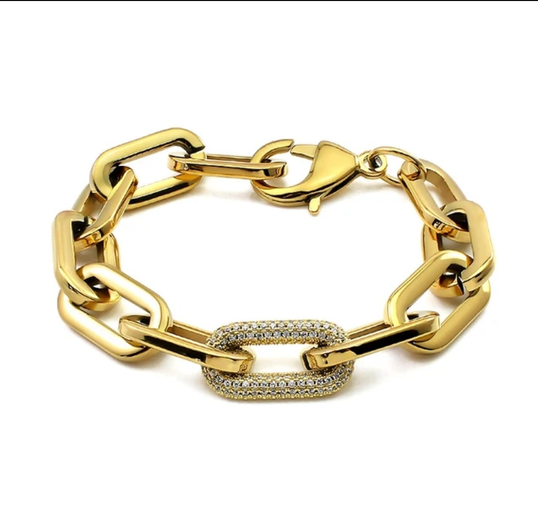 The Zirconmania Fashion Jewelry Unisex PaperClip Link Chain Bracelet 856B100 features bold, polished stainless steel links with a central zirconite-encrusted link and a lobster clasp for a stylish, unisex look.
