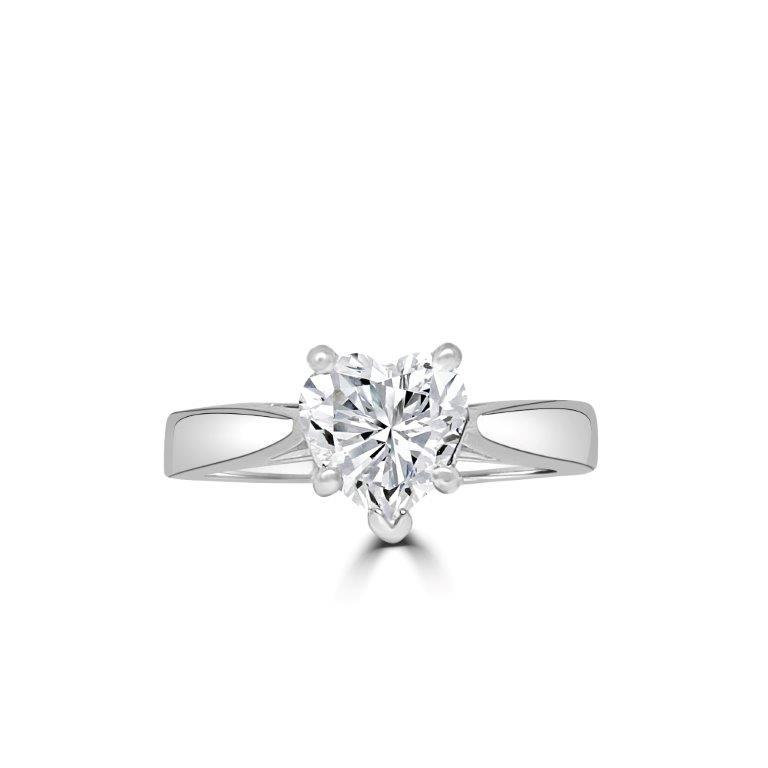 The DiamondVeneer Fashion Heart Diamond Veneer Cubic Zirconia 14K Gold Ring (635R002K) features a heart-shaped clear stone at its center, set on a sleek polished band with a split shank design.