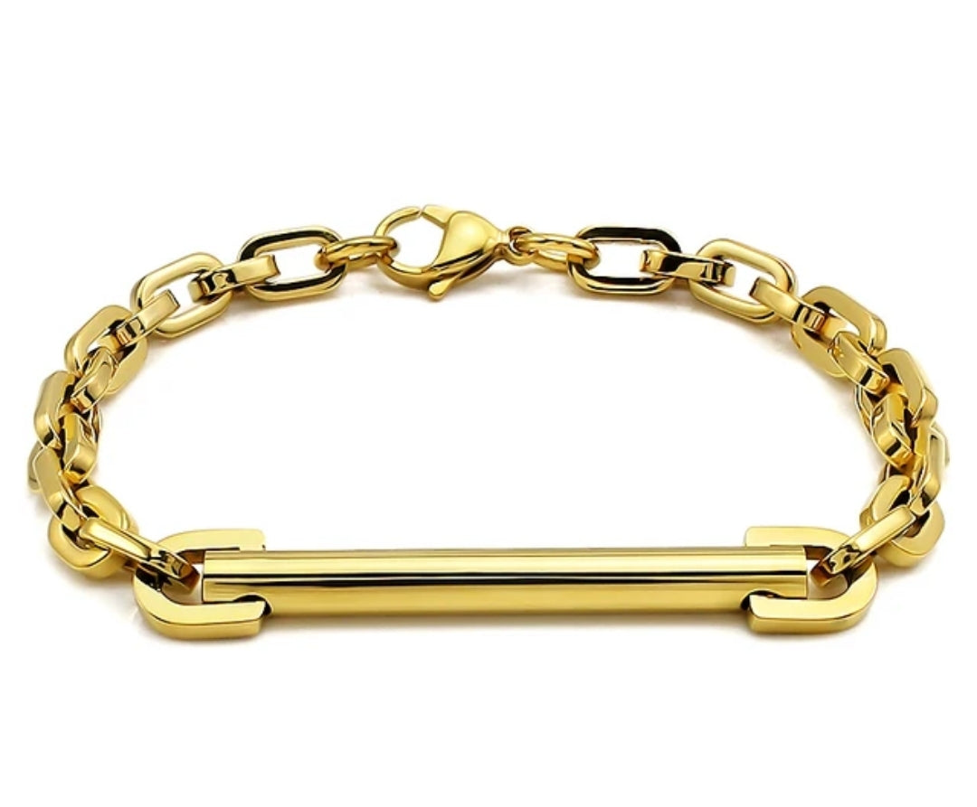 The Zirconmania Fashion Jewelry Unisex ID Bar Chain Bracelet features thick rectangular links, a flat central bar, and a lobster clasp, offering minimalist, timeless style for any occasion.