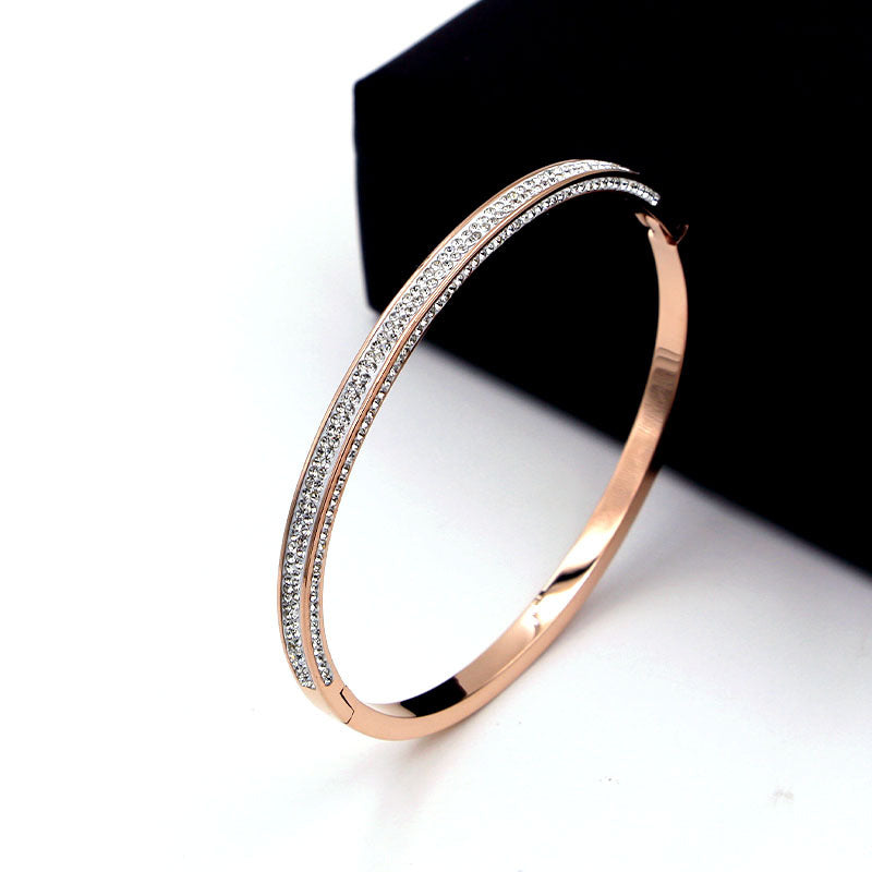 Zirconite Stainless Steel hinged RoseGold Bangle Bracelet. 709B11