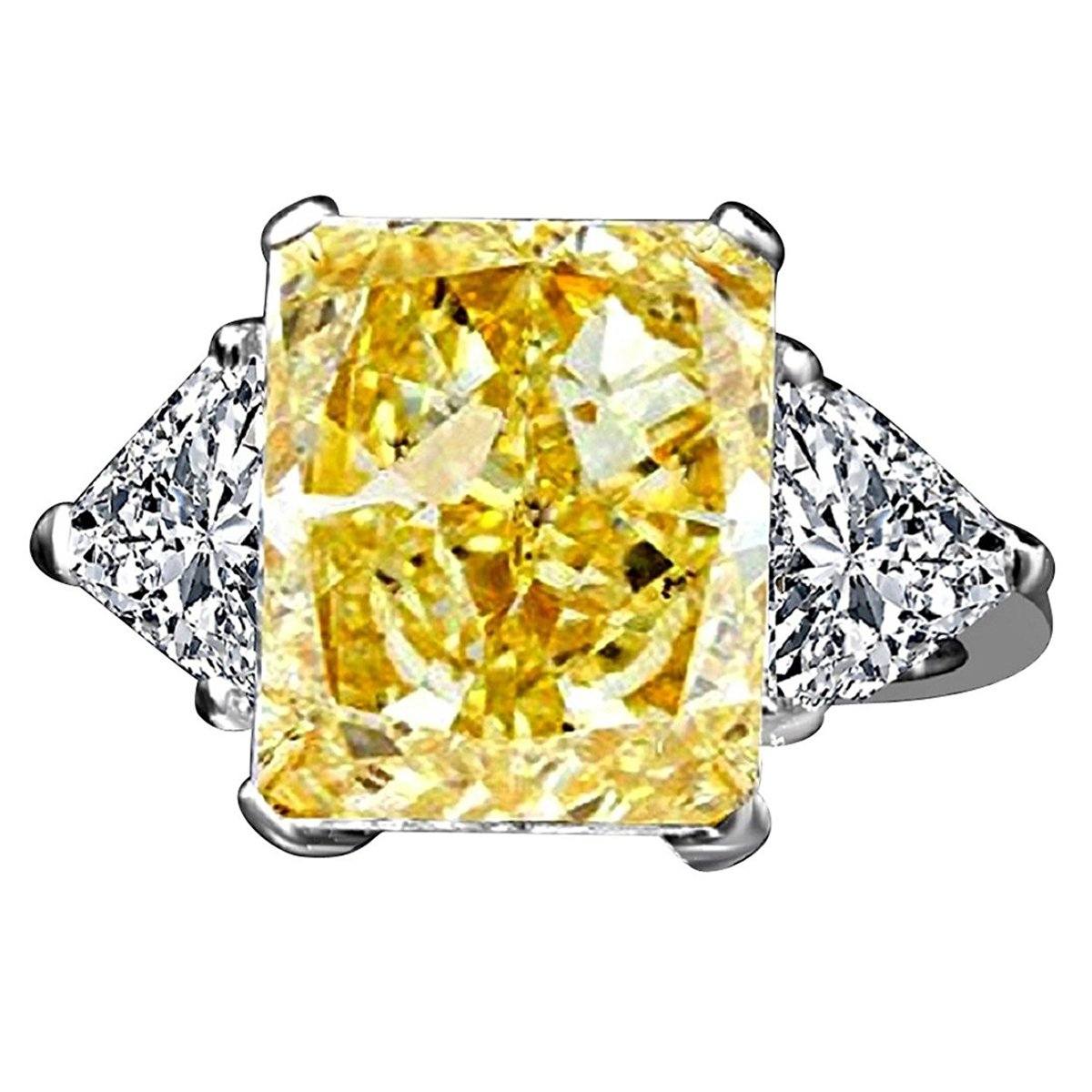 The DiamondVeneer Fashion 10CT Diamond Veneer Cubic Zirconia Three Stone 14K Gold Ring features a yellow center stone and two triangle accents, all enhanced by Diamond Veneer for exceptional brilliance.