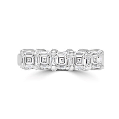 The DiamondVeneer Fashion 1.5CT TW Asscher cut Diamond Veneer Cubic Zirconia Ring (635R007K) features five Asscher-cut stones set in a sleek 14K white gold band for a modern, elegant look.