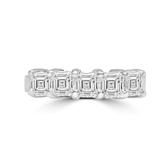 The DiamondVeneer Fashion 1.5CT TW Asscher cut Diamond Veneer Cubic Zirconia Ring (635R007K) features five Asscher-cut stones set in a sleek 14K white gold band for a modern, elegant look.