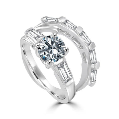 The DiamondVeneer Fashion 1CT Round Cubic Zirconia Engagement Ring Set (635R32110) features a round center stone with rectangular accents in a classic three-stone design, paired with a matching band set with rectangular stones. Final sale.