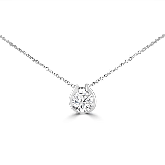 The DiamondVeneer Fashion Horse Shoe Diamond Veneer Cubic Zirconia Pendant features a delicate sterling silver chain and a round cubic zirconia set in a horseshoe-shaped holder.