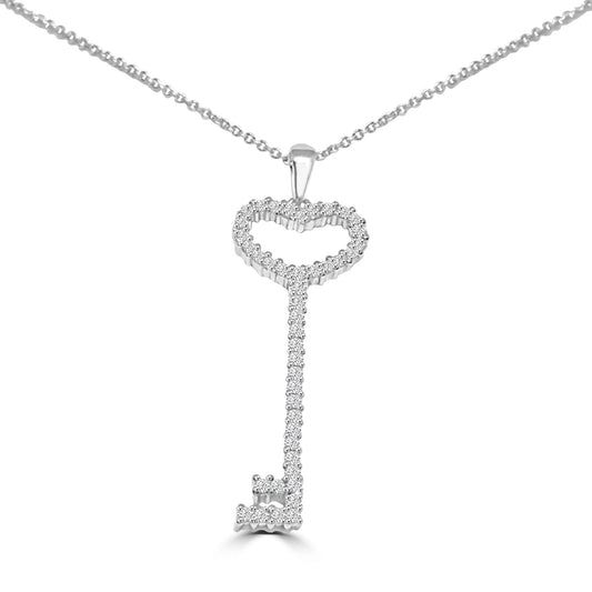 The DiamondVeneer Fashion Heart Zirconite Cubic Zirconia Key Pendant (602P20548) is a rhodium plated necklace with a key-shaped pendant adorned with sparkling cubic zirconia, shown against a white background.