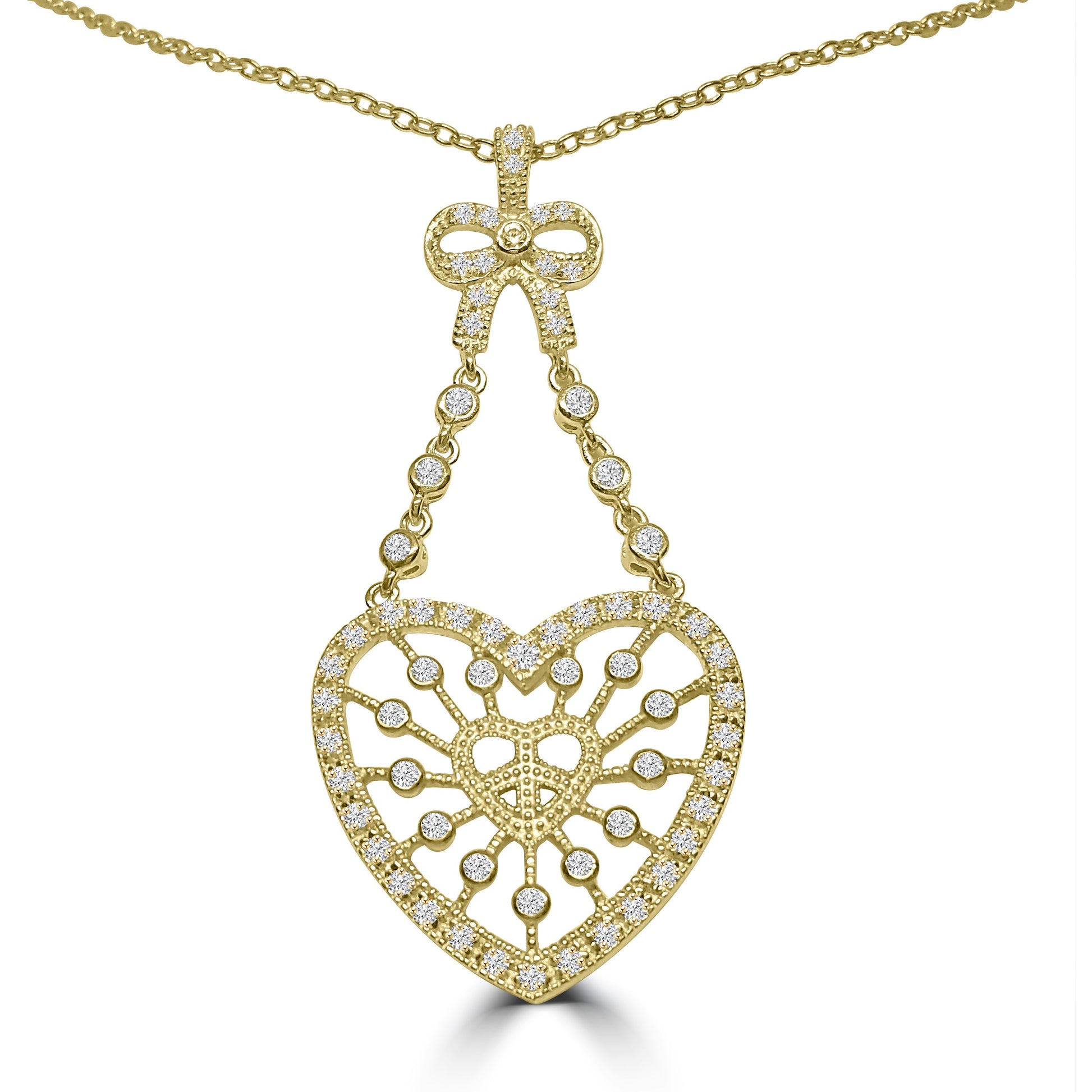 The DiamondVeneer Fashion Large Zirconite Cubic Zirconia Heart & Peace Pendant (STN218) features a sparkling heart-shaped pendant with intricate patterns and white stones, hanging from a bow detail also encrusted with stones.