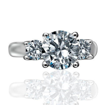 2CT round cubic zirconia three-stone ring - close-up sparkle