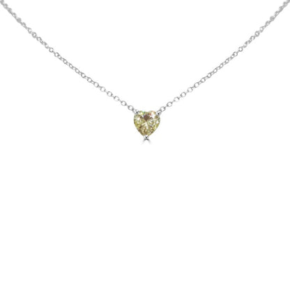 The DiamondVeneer Fashion 1CT Heart Diamond Veneer Cubic Zirconia Solitaire Pendant features a heart-shaped yellow cubic zirconia on a sterling silver chain, perfectly displayed against a white background.