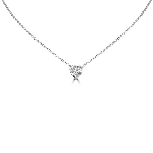 The DiamondVeneer Fashion 1CT Heart Diamond Veneer Cubic Zirconia Solitaire Pendant is a delicate sterling silver necklace with a heart-shaped cubic zirconia on a fine chain, shown on a plain white background.
