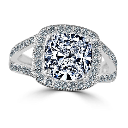 The DiamondVeneer Fashion 3.5CT Square Cushion Diamond Veneer Cubic Zirconia 14K Gold Ring (635R0246K) features a split-shank design with a halo of stones around the center and along the band for extra brilliance.