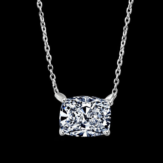 The DiamondVeneer Fashion Cushion Diamond Veneer Cubic Zirconia Pendant Necklace 635P11x9 features a sterling silver chain and four-prong cushion pendant, displayed against a solid black background.