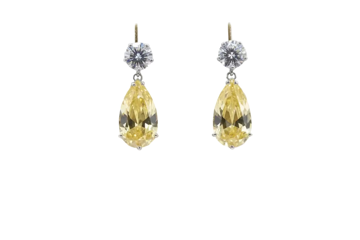 Luxury pear-cut CZ drop earrings by DiamondVeneer in blue, dark blue, pink, yellow & champagne. Elegant, eye-catching fashion jewelry.