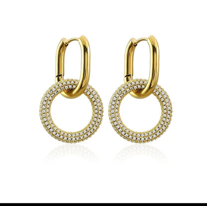 DiamondVeneer Fashion’s Stainless Steel Door Knocker Earrings (Zirconite 856E101) feature round, double-layered gold hoops with white zirconite gems—stylish, modern, and perfect for any occasion.