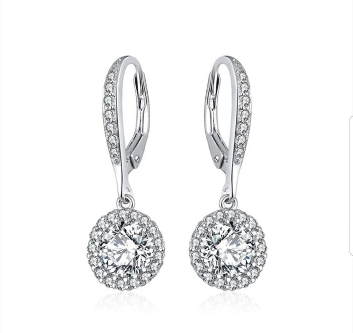 The DiamondVeneer Fashion Cubic Zirconia Earrings (635E10687) feature round center stones with a halo of smaller clear accents, set in sterling silver lever-backs for timeless elegance.
