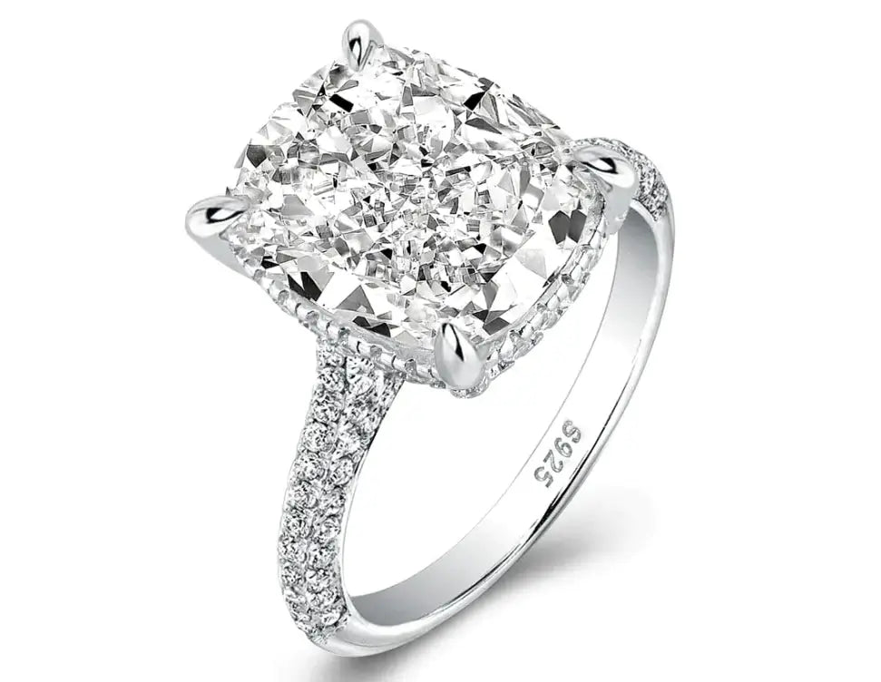 Cushion-cut DiamondVeneer cubic zirconia ring with sparkling band accents, offering a luxe, modern take on classic design.