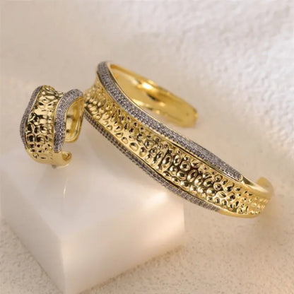 Open hammered gold bangle bracelet with matching ring