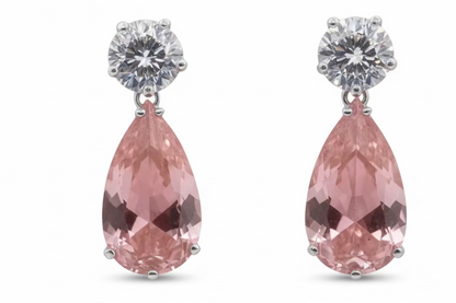 Luxury pear-cut CZ drop earrings by DiamondVeneer in blue, dark blue, pink, yellow & champagne. Elegant, eye-catching fashion jewelry.