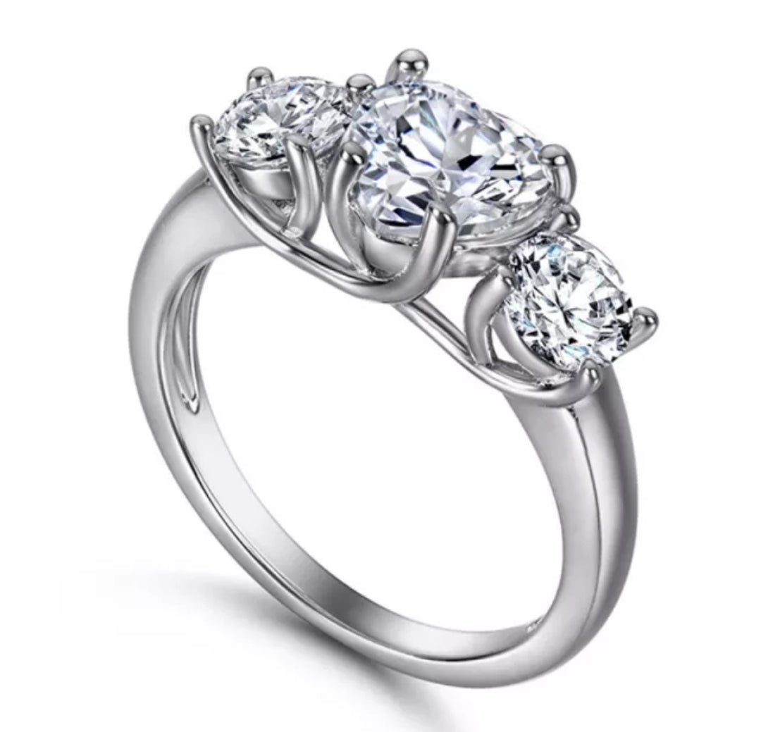 2CT round cubic zirconia three-stone ring - on hand