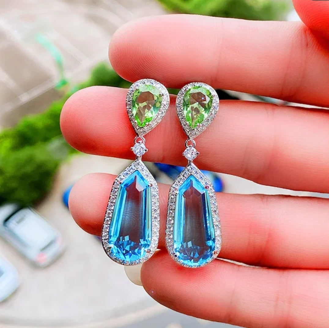 Aqua blue cubic zirconia drop earrings by Zirconite, worn on model, 826E1074
