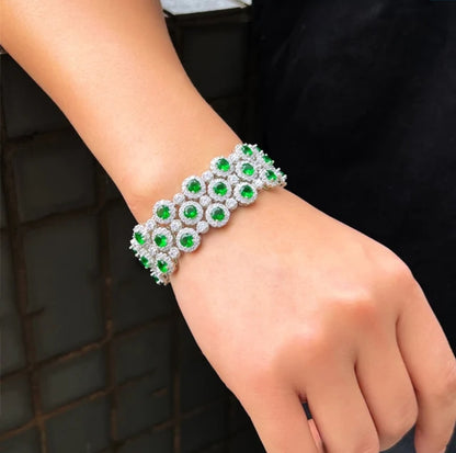 Couture cubic zirconia bracelet by Zirconite, emerald green stone worn on model, 826B100