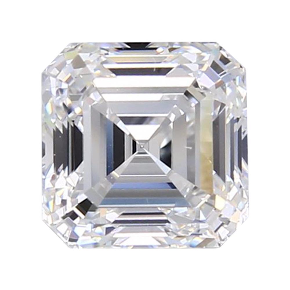 A close-up of the DiamondVeneer Fashion Asscher Cut Diamond Veneer Cubic Zirconia Loose Stone highlights its square shape, beveled corners, and step-cut facets reflecting geometric patterns against a white background.