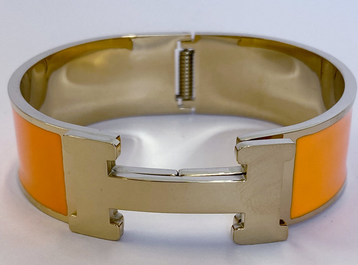 Enamel hinged stainless steel bangle by Zirconite, coral color, 500B6487