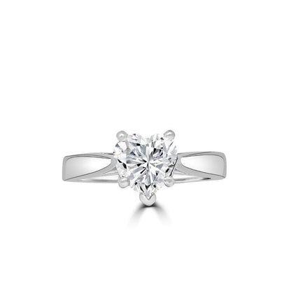 The DiamondVeneer Fashion Heart Diamond Veneer Cubic Zirconia 14K Gold Ring (635R002K) features a heart-shaped clear stone at its center, set on a sleek polished band with a split shank design.