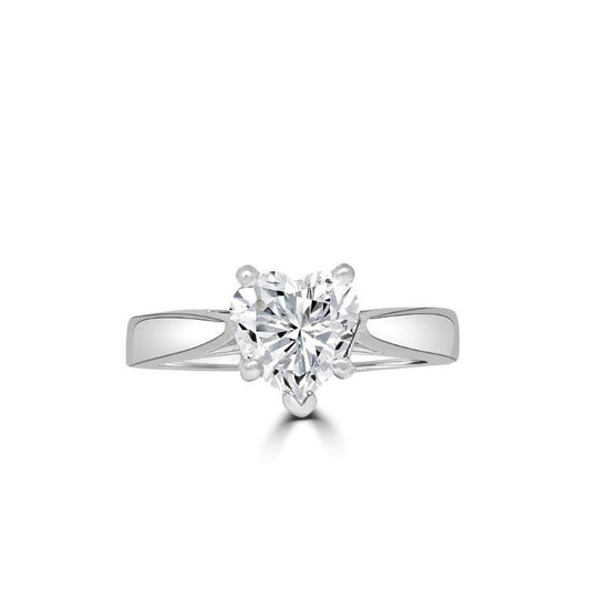 The DiamondVeneer Fashion Heart Diamond Veneer Cubic Zirconia 14K Gold Ring (635R002K) features a heart-shaped clear stone at its center, set on a sleek polished band with a split shank design.
