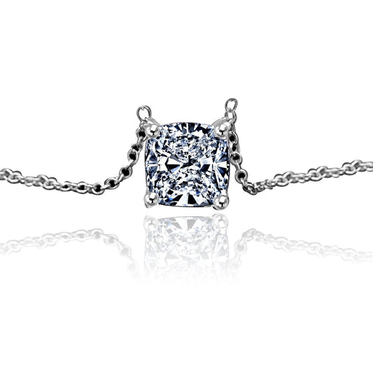 The DiamondVeneer Fashion Cushion Square Cubic Zirconia 14K Gold Solitaire Pendant (635P208K) features a sparkling stone in a classic setting, hanging from a fine chain and showcased on a white background with a subtle reflection.