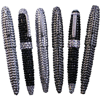 Six DiamondVeneer Fashion Jeweled Pens, adorned with alternating black and silver rhinestones, stand upright in a neat row against a white background.
