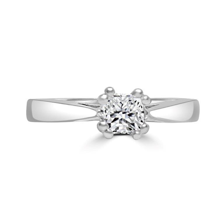 The DiamondVeneer Fashion Princess Cut Square Diamond Veneer Cubic Zirconia 14K Gold Ring (635R011K) offers an elegant alternative to a classic engagement ring, featuring a sparkling square stone set in polished 14K gold.
