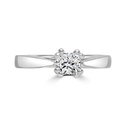 The DiamondVeneer Fashion Princess Cut Square Diamond Veneer Cubic Zirconia 14K Gold Ring (635R011K) offers an elegant alternative to a classic engagement ring, featuring a sparkling square stone set in polished 14K gold.