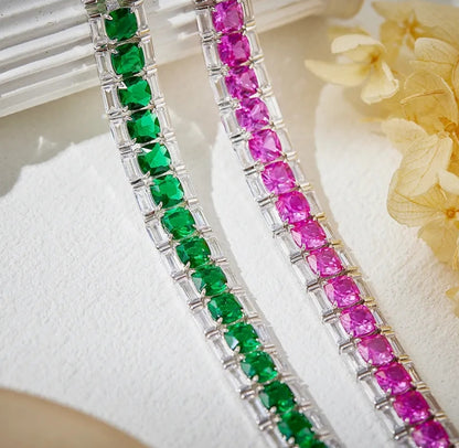 Zirconmania bracelet features baguette and cushion-cut pink zirconite stones, showcasing a unique, elegant tennis design.