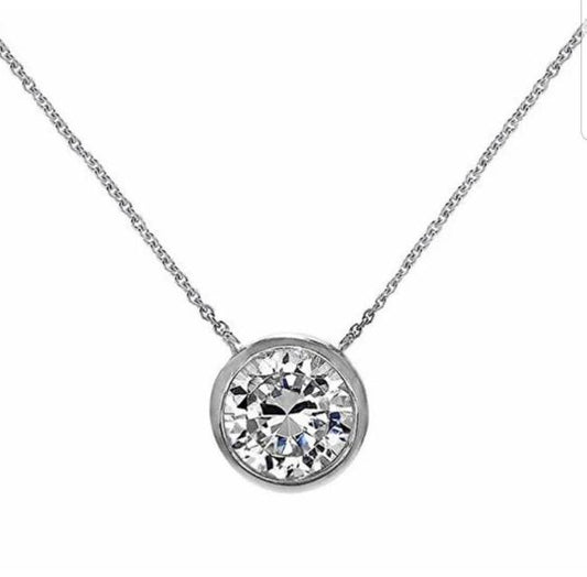 The DiamondVeneer Fashion Cubic Zirconia 14K Gold Bezel Solitaire Pendant (635ZBYX1K) features a single round, bezel-set cubic zirconia on a delicate chain, centered against a white background.