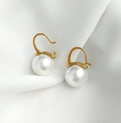 White pearl and cubic zirconia earrings by Zirconite, worn on model, 826E3092