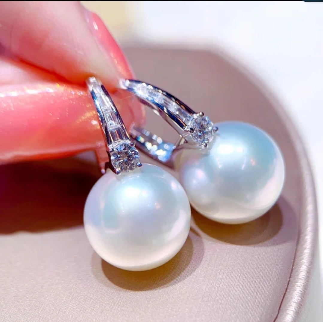 White pearl and cubic zirconia huggie earrings by Zirconite, alternate view, 851E2949