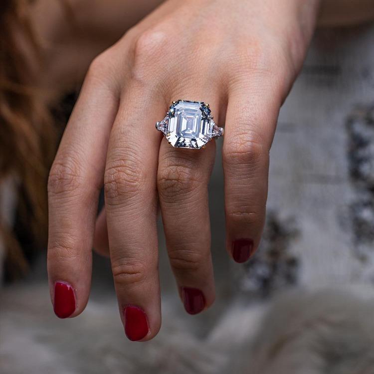 15 CT Asscher-cut cubic zirconia three-stone ring in sterling silver, worn on hand close-up, 801R9007