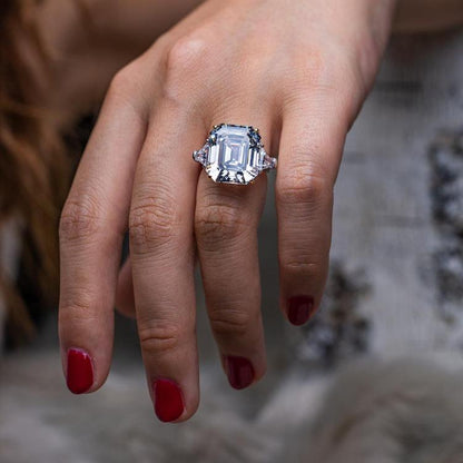 15 CT Asscher-cut cubic zirconia three-stone ring in sterling silver, worn on hand close-up, 801R9007