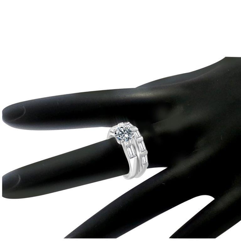 1 CT round cubic zirconia three-stone engagement ring set in sterling silver, worn on hand, 635R32110