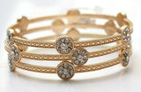 Zirconite set of Three Fashion Gold Bangle Bracelets. 657B3411