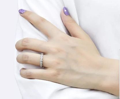 Bezel-set cubic zirconia eternity band ring, worn on model, 635RBEZEL