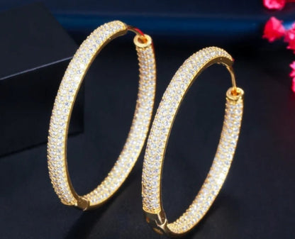Double-view cubic zirconia hoop earrings by Zirconite, worn on model, 826E05