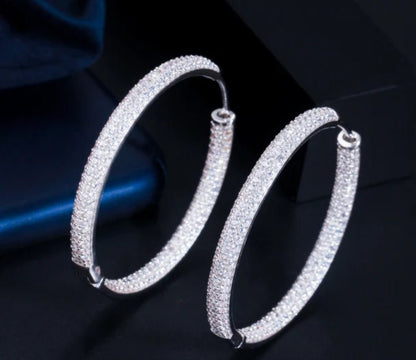 Double-view cubic zirconia hoop earrings by Zirconite, worn on model, 826E05
